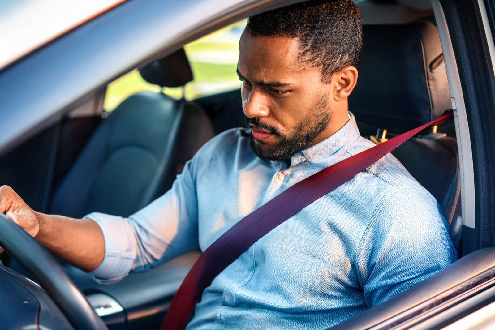 man-in-car-seatbelt